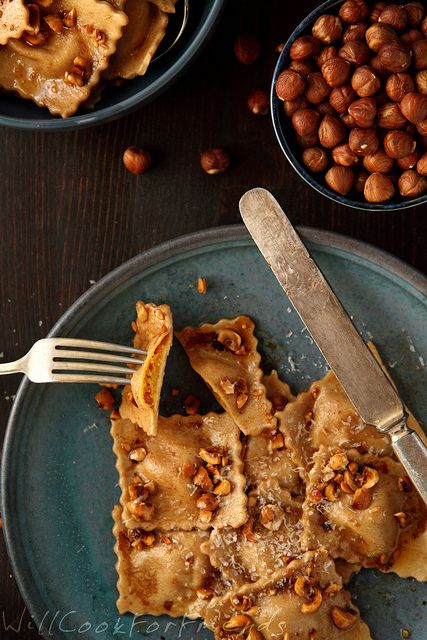 ravioli with hazelnut brown butter sauce and balsamic drizzle