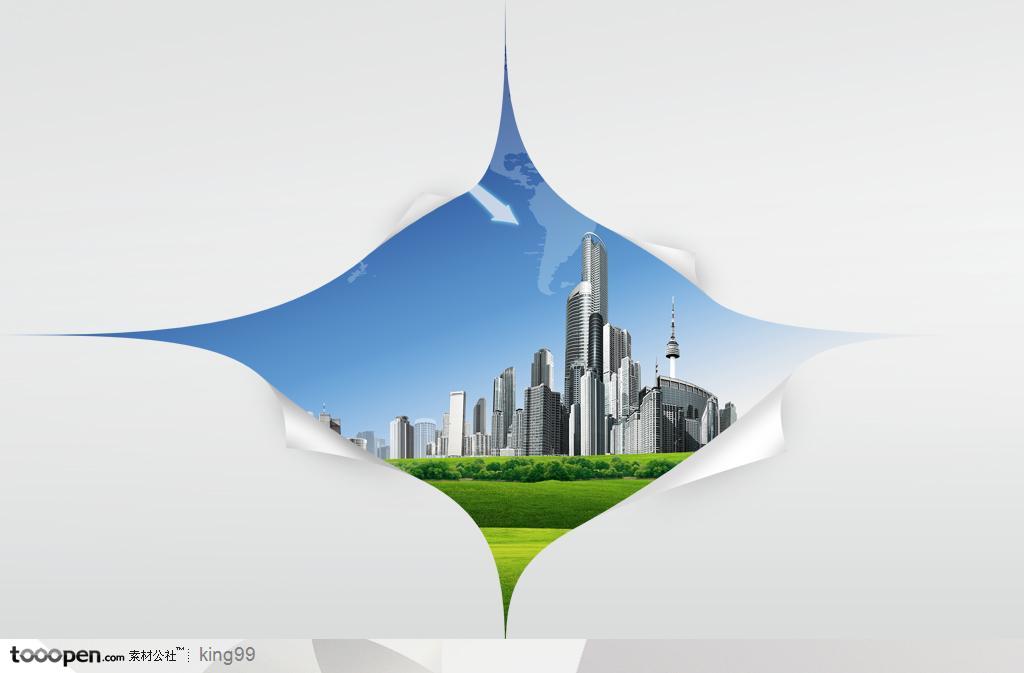 创意商业房地产广告之划破的纸后面的城市建筑景观