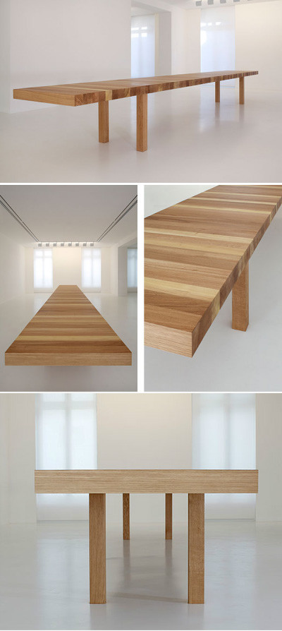 法国建筑师jean nouvel设计的一张4米长的大桌子,用橡木大料制作,限量