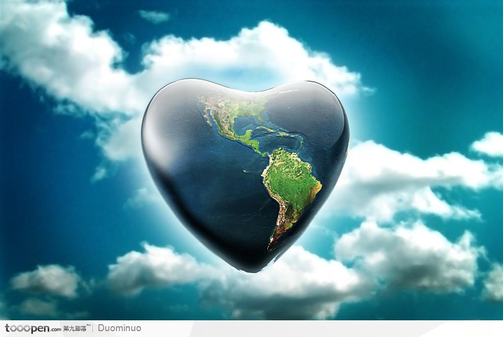 蓝天白云下心形的地球生活百科图片素材