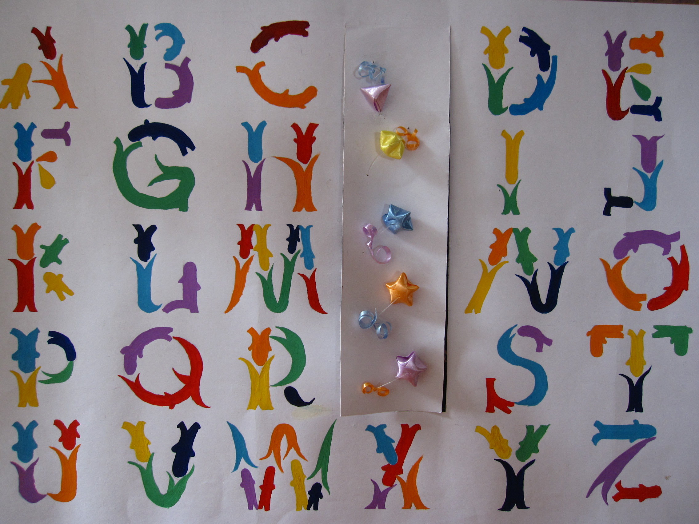 26个字母手工剪纸教案图片