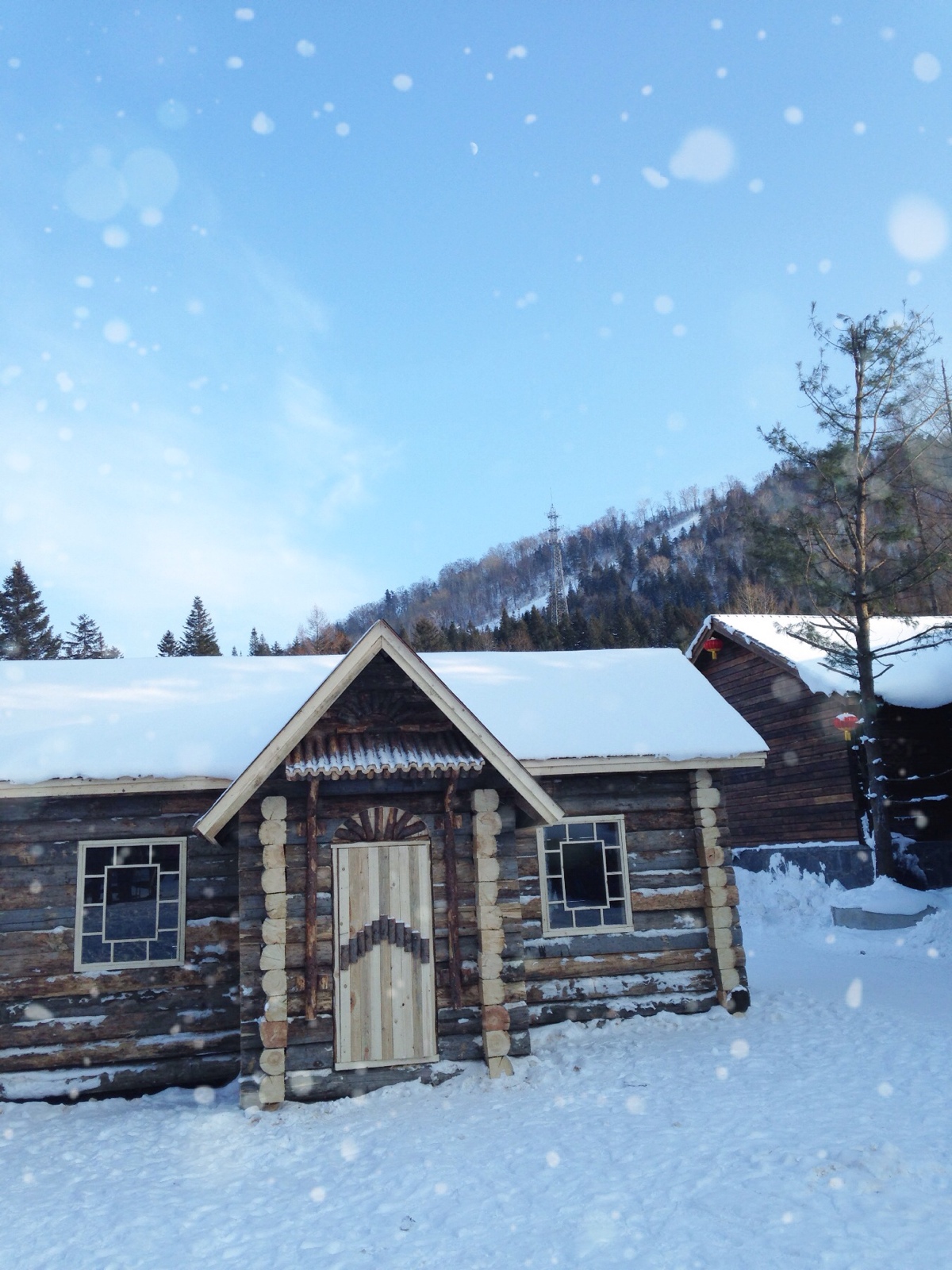 东北小木屋雪景图片