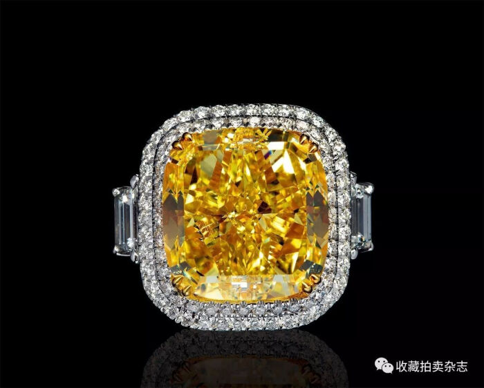 82克拉枕形切割的浓彩黄色钻石,净度为vs2级别,周边镶配无色钻石,指环