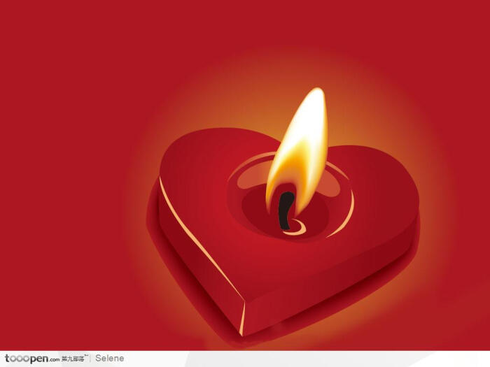 燃烧的温暖红色心形蜡烛