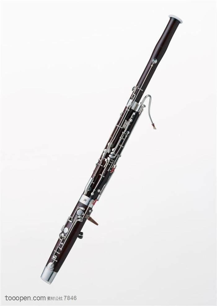 乐器笛子-斜着摆放着的金属黑色笛子生活用品图片素材