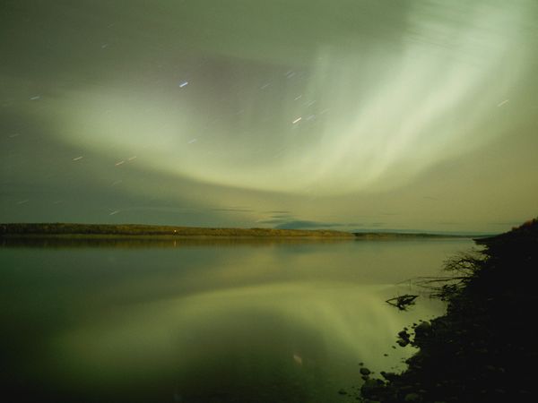 photo: aurora borealis above the mackenzie river in the