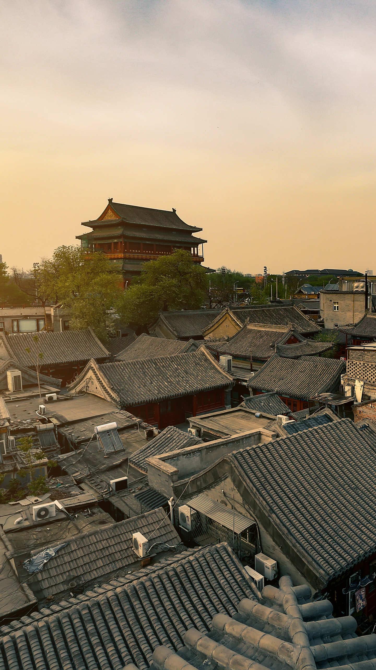 鼓楼夕阳—华为杂志锁屏坐落在北京市南北中轴线的古代建筑,两旁分布