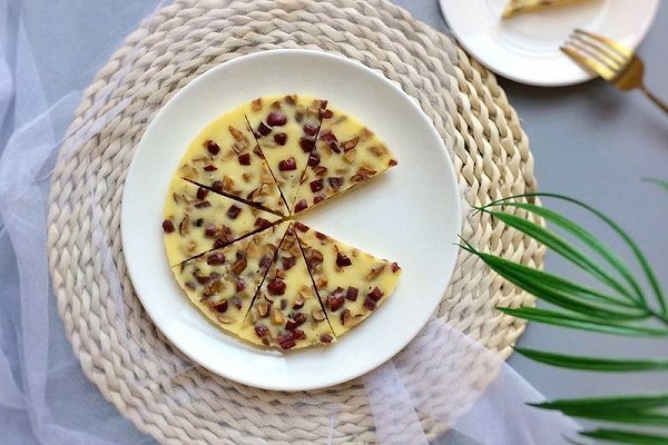 红枣牛奶糕味道香甜,可以再放一些核桃、南…