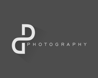DG摄影工作室logo设计是将DG两个字母结合到